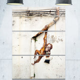baby orangutan hanging from pipe street art canvas print PT6969
