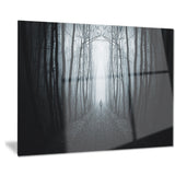 man walking in dark forest landscape photo canvas print PT8179