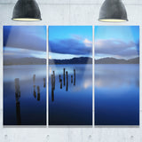 dark blue sea with pier remains seascape photo canvas print PT8367