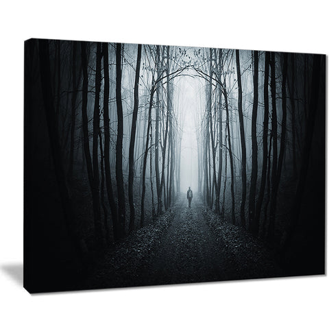 man walking in dark forest landscape photo canvas print PT8179