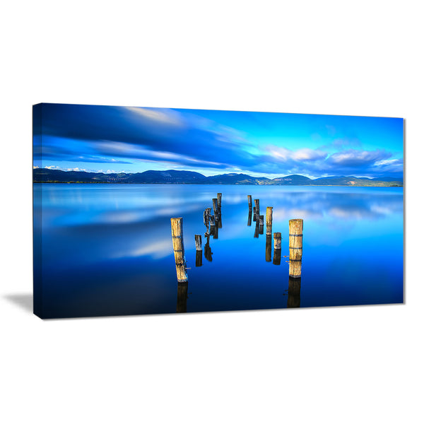 wooden pier remains in blue sea seascape photo canvas print PT8361