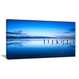 jetty remains in blue sea seascape photo canvas print PT8365