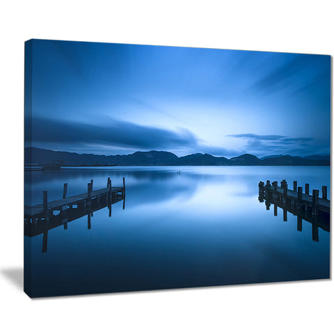 dark blue sea and piers seascape photo canvas print PT8392